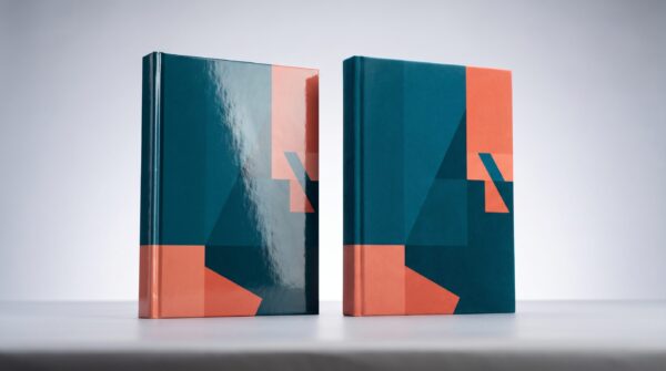 Matte vs glossy book cover comparison: a glossy reflective paperback beside a matte non-reflective paperback